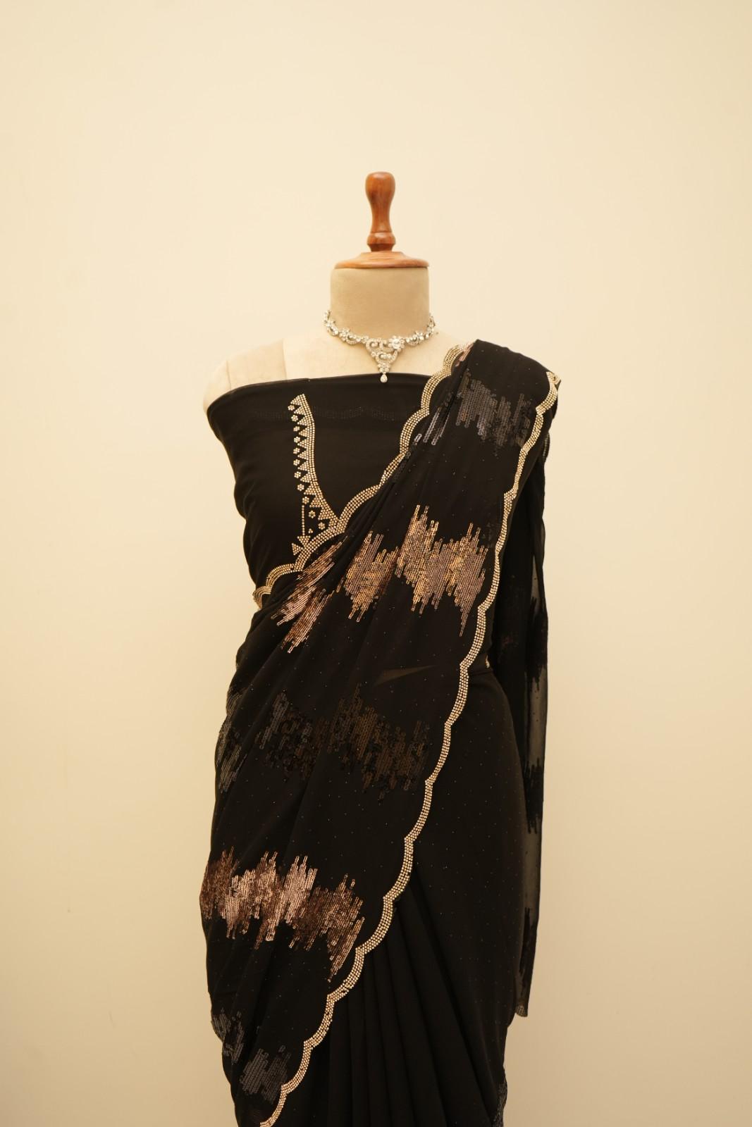 The rich black base beautifully enhances the subtle shimmer.
Designed for a graceful, fluid drape that feels effortlessly elegant.