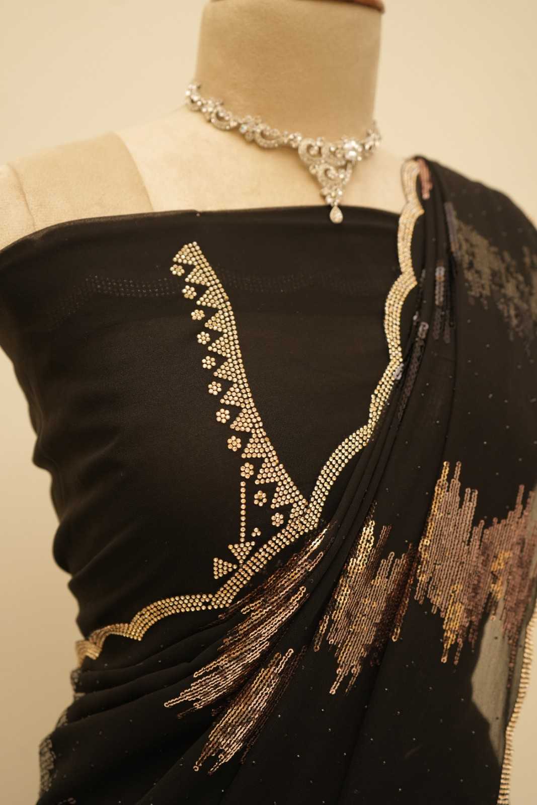 The rich black base beautifully enhances the subtle shimmer.
Designed for a graceful, fluid drape that feels effortlessly elegant.
