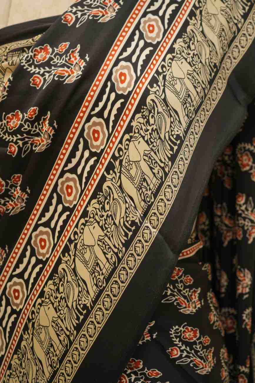Black floral Ajrakh modal silk saree with ethnic print