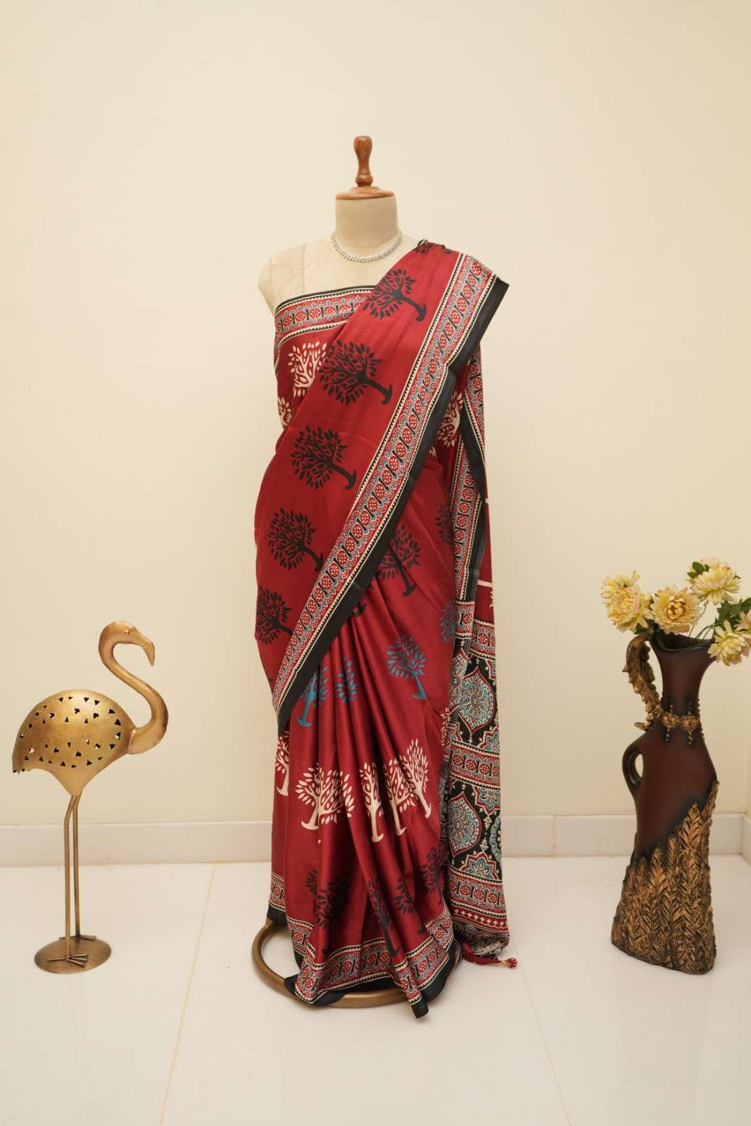 Red modal silk saree with classic Ajrakh patterns