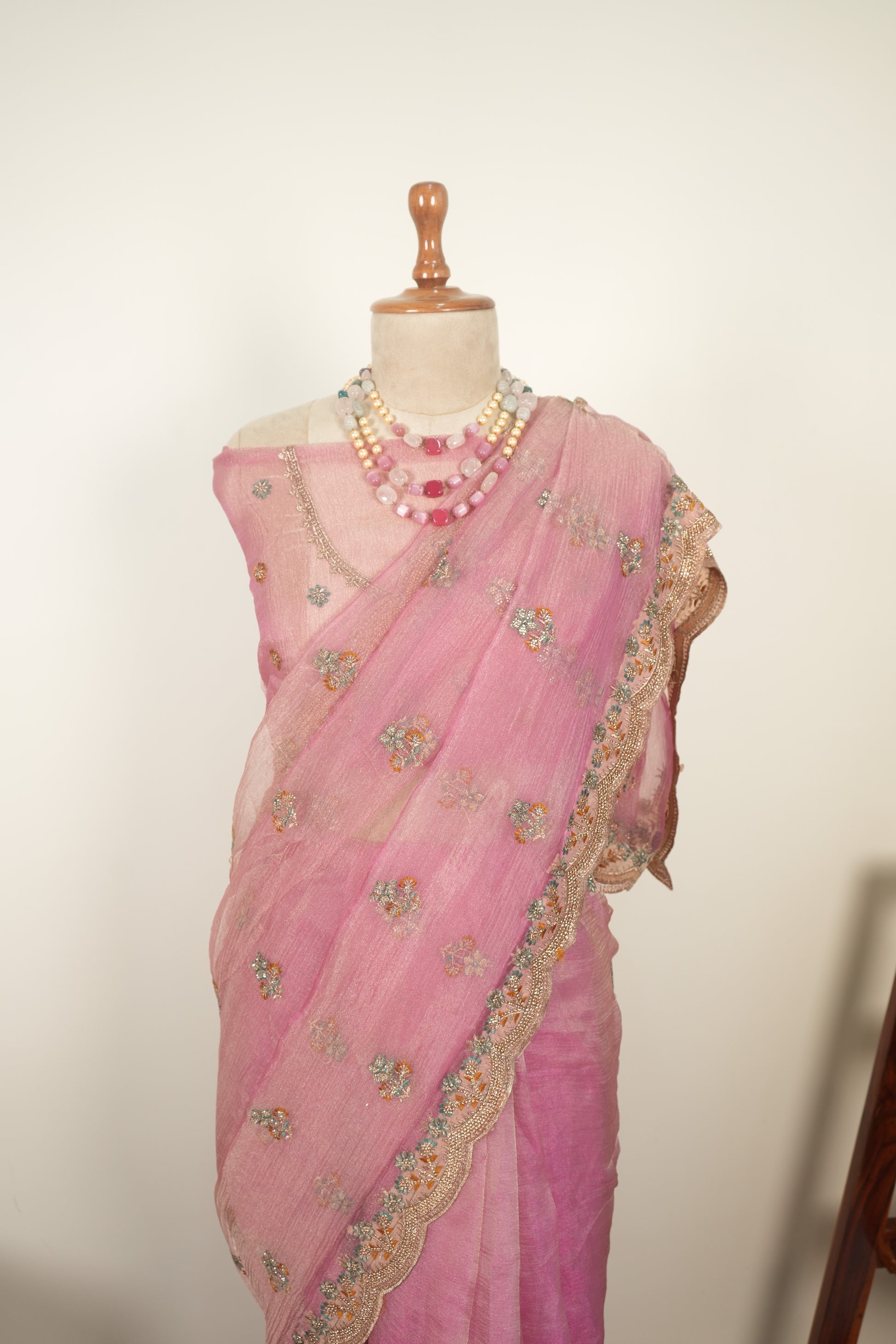 Pink crushed organza saree with zari work and gentle jarkan embellishments, elegant festive and party wear saree for women