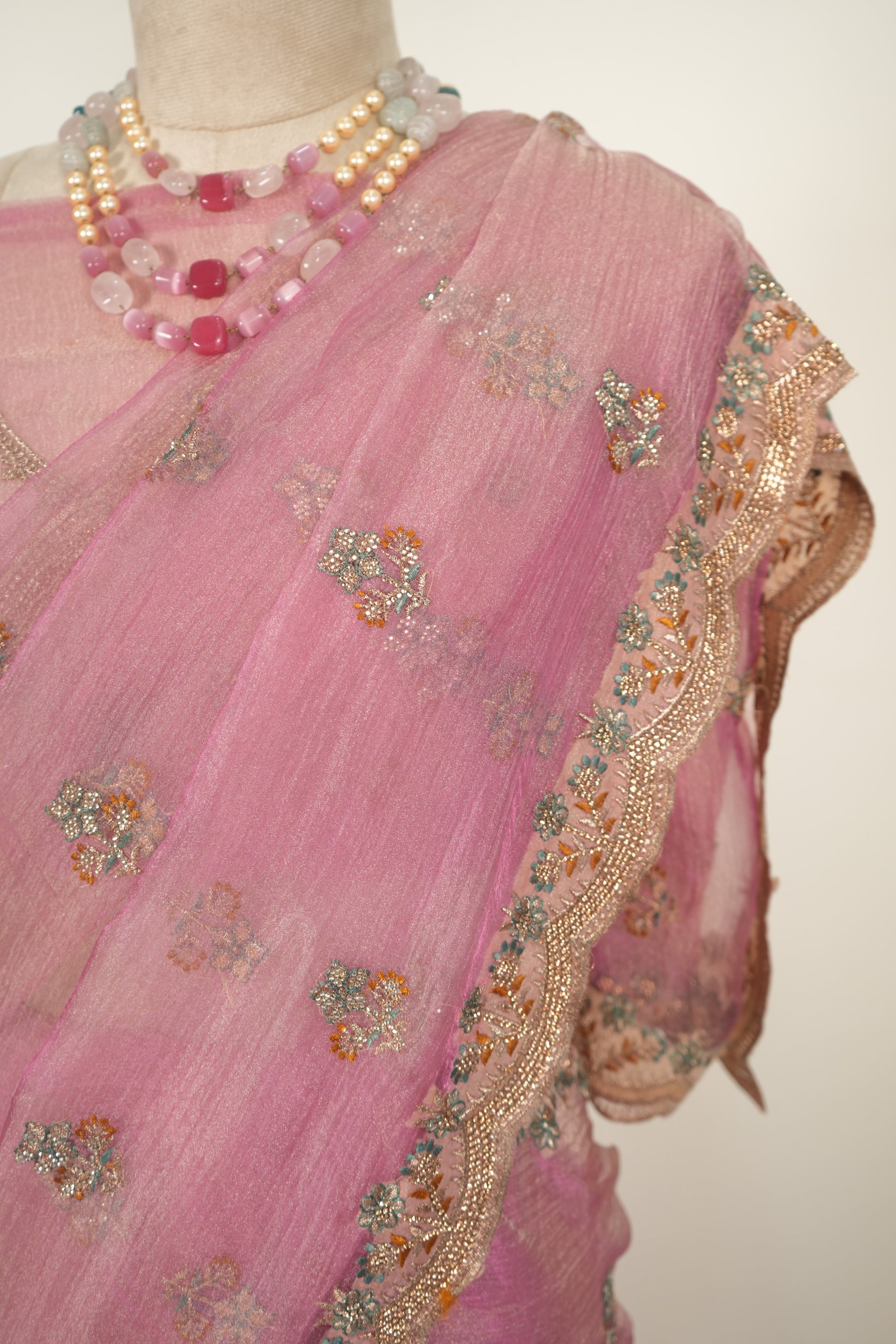 Pink crushed organza saree with zari work and gentle jarkan embellishments, elegant festive and party wear saree for women