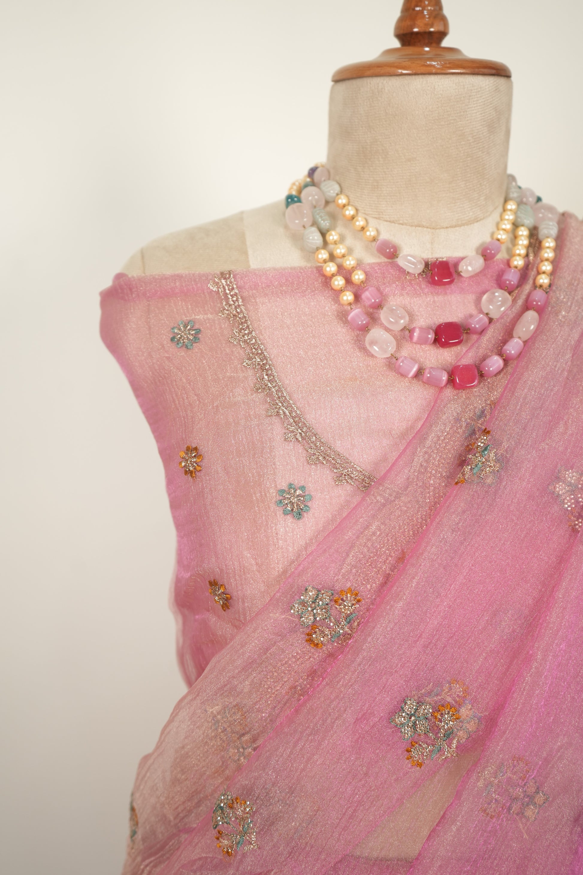 Pink crushed organza saree with zari work and gentle jarkan embellishments, elegant festive and party wear saree for women