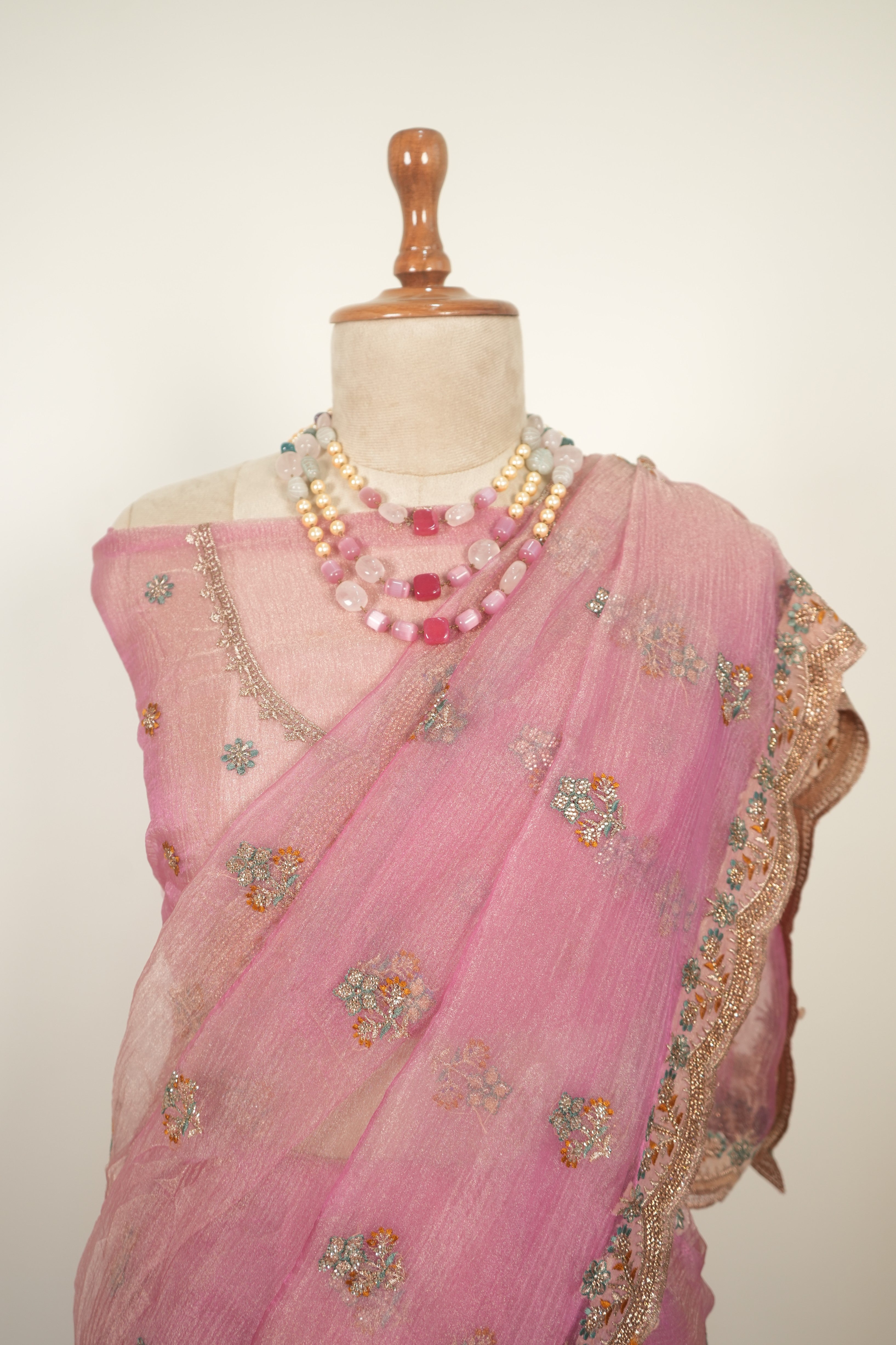 Pink crushed organza saree with zari work and gentle jarkan embellishments, elegant festive and party wear saree for women
