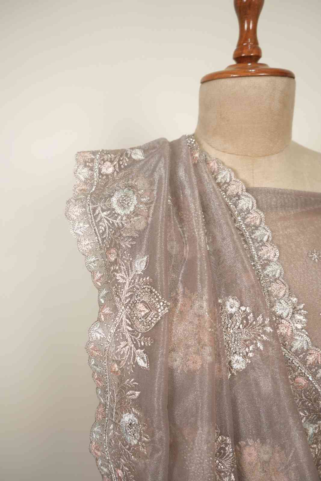 Zari and stone work saree with elegant embroidered border, perfect festive and party wear saree for women