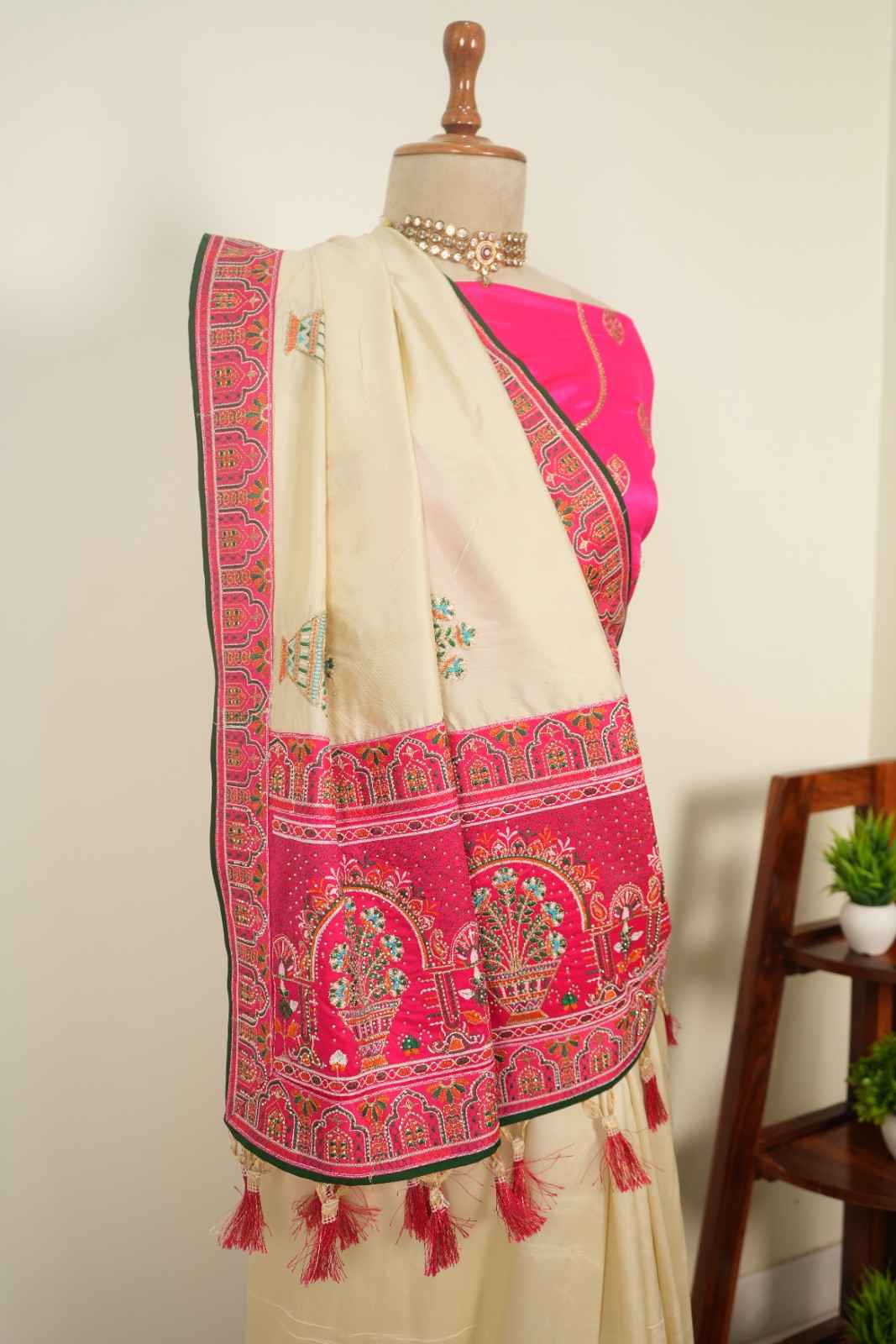 Cream saree with pink traditional border and tassels, mix of pink and cream festive wedding function saree for women