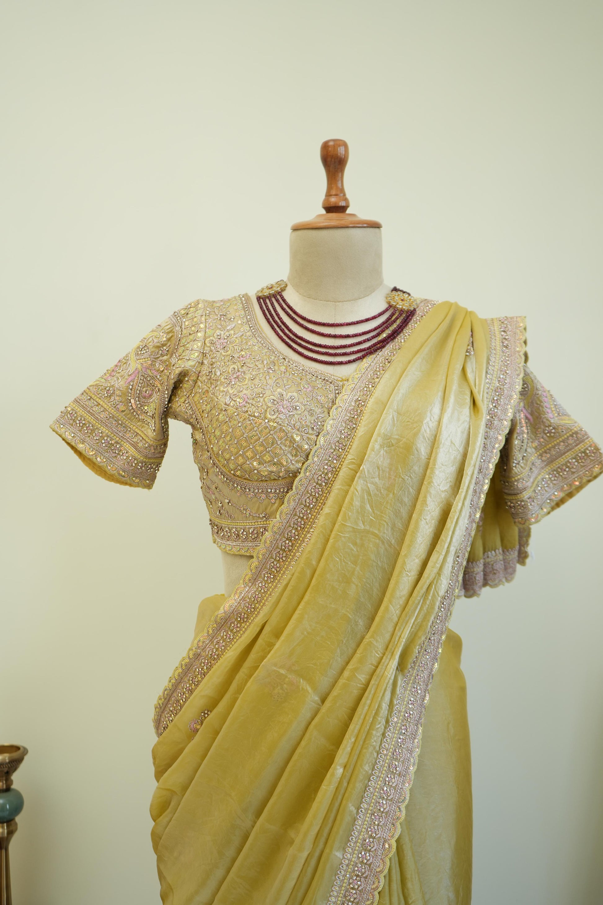 Stitched blouse with yellow festive saree and embellished border, perfect haldi and wedding function saree for women