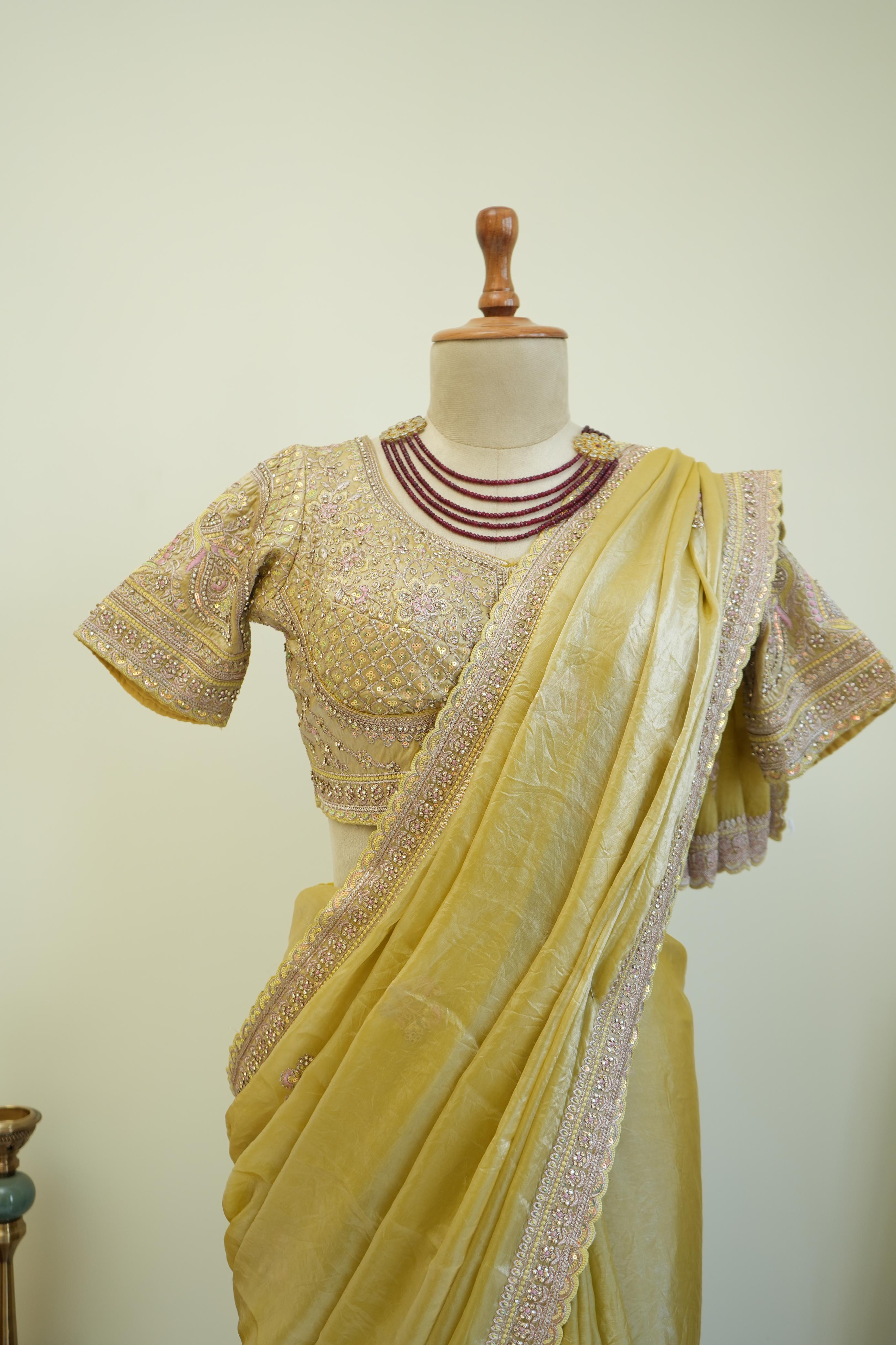 Stitched blouse with yellow festive saree and embellished border, perfect haldi and wedding function saree for women