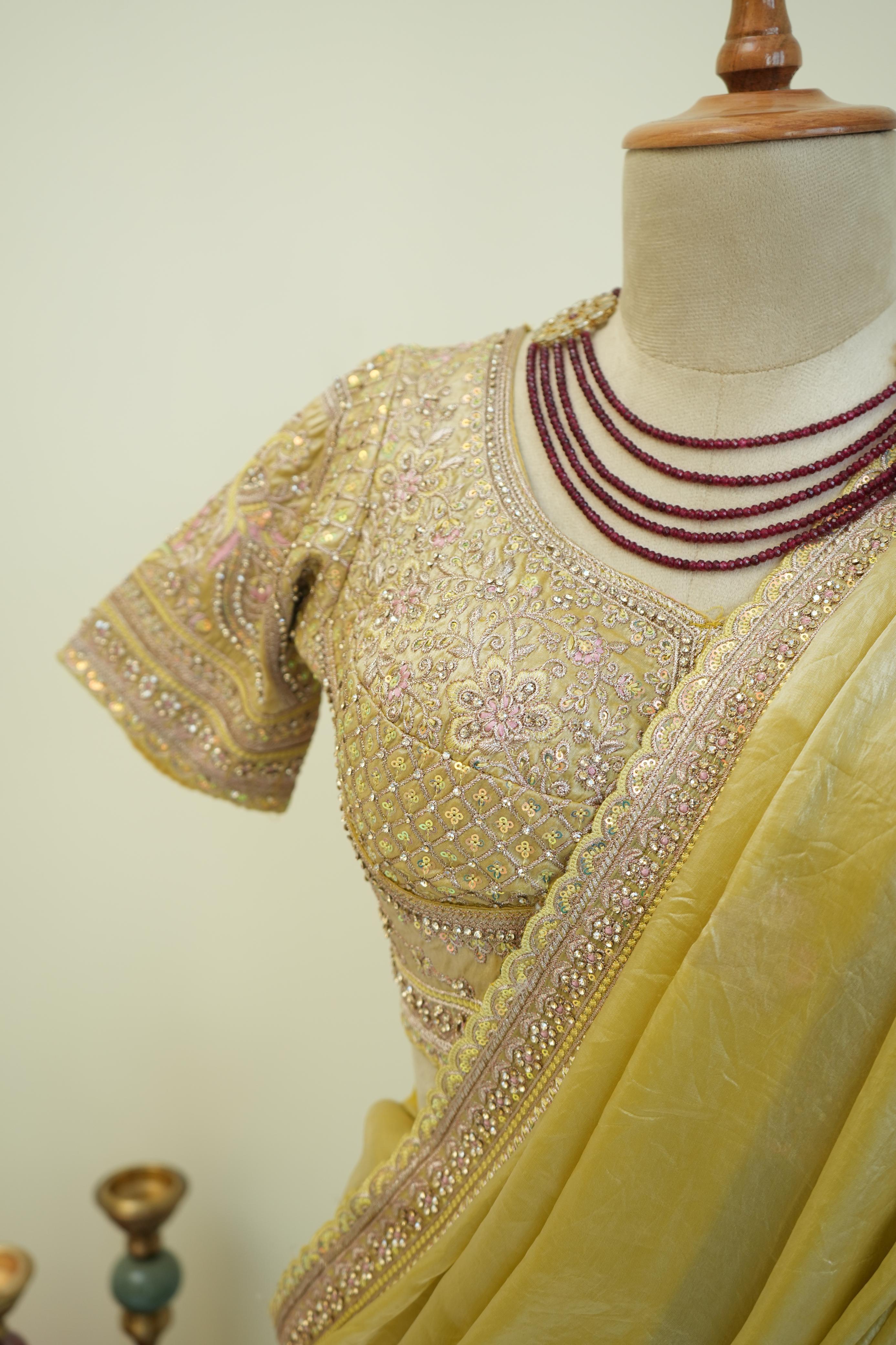 Stitched blouse with yellow festive saree and embellished border, perfect haldi and wedding function saree for women