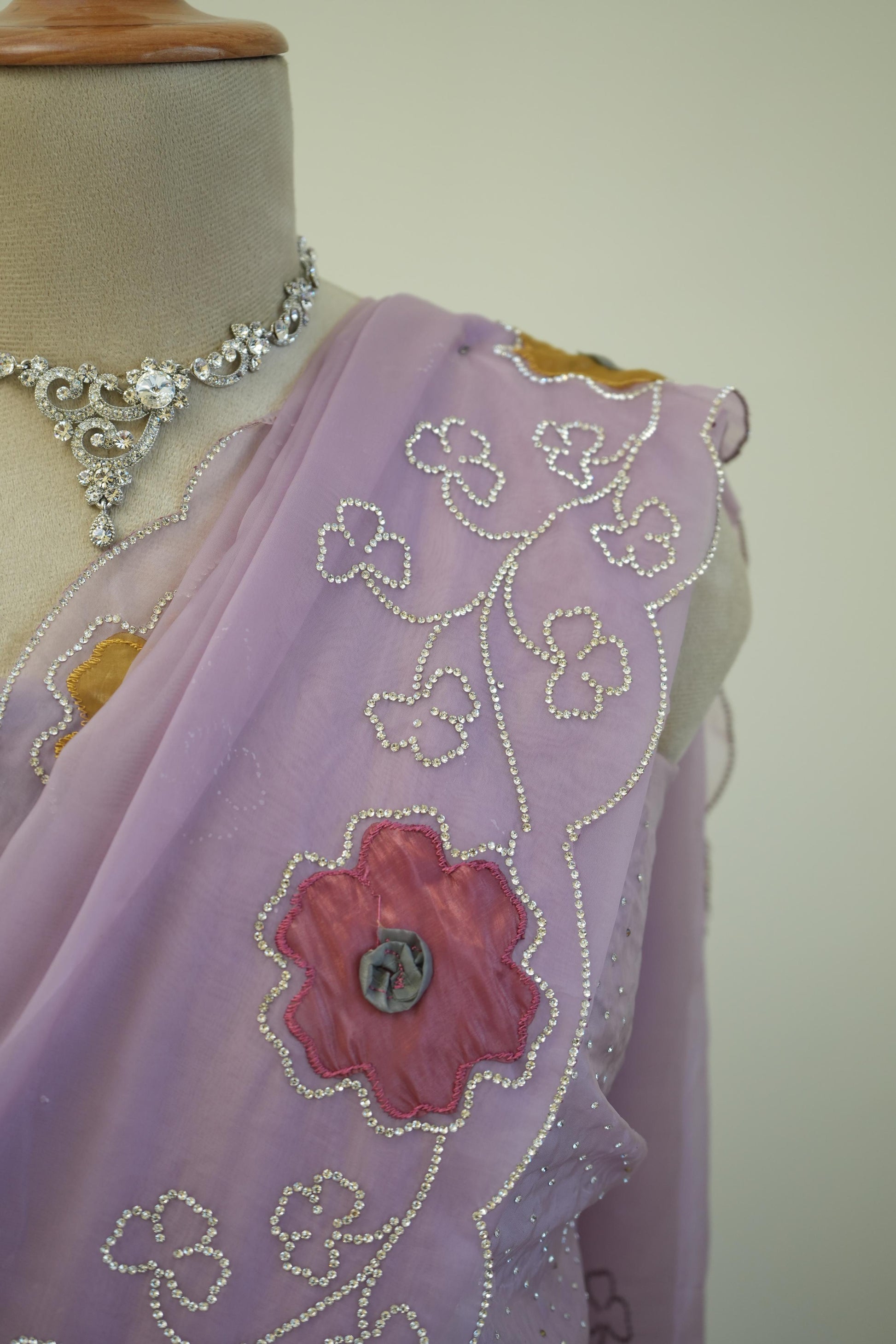 Purple saree with floral border and white stone work, elegant festive and party wear saree for women