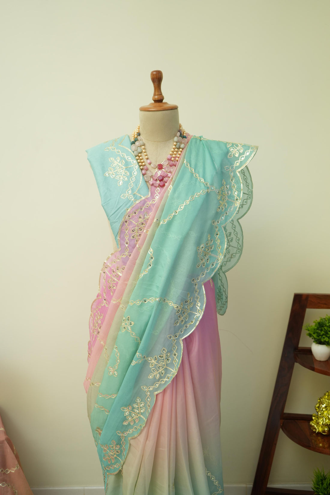 This ombre style saree with gradient tones and gotta patti embroidery is ideal as an occasion wear saree for women.